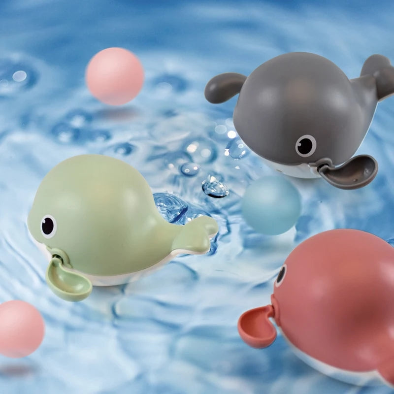 van Theo® - Badspeeltje Walvis - Opwindbaar Badspeelgoed - Water Speelgoed voor in Bad - Roze - Vanaf 1 jaar