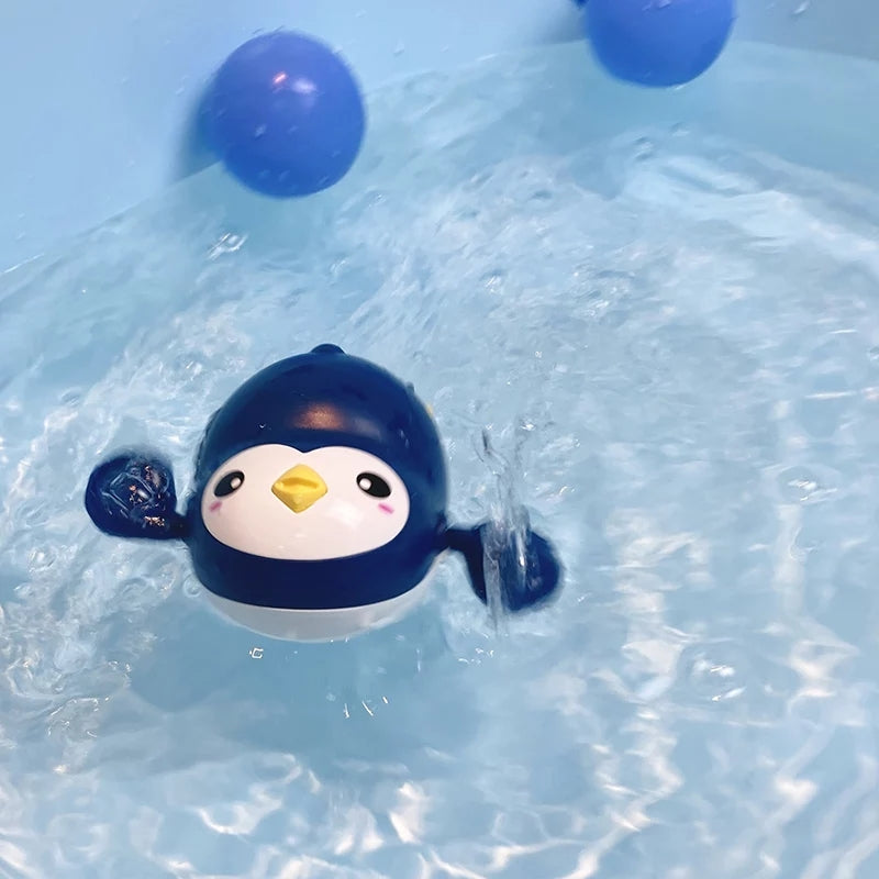 van Theo® - Badspeeltje Pinguin - Opwindbaar Badspeelgoed - Water Speelgoed voor in Bad - Blauw - Vanaf 1 jaar